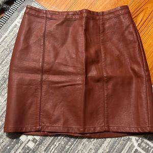 Faux leather mini skirt. Reddish brown size small